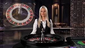 Excited gamers enjoying sports betting and casino games on mobile devices in the Philippines